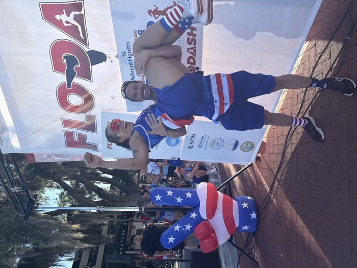 Kim and Niles Pfeiffer being playful at a local race